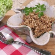 Louisiana rice dressing in a green dish.