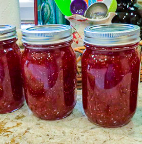 Three jars of Strawberry Fig jam.