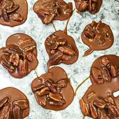 Pecan pralines on parchment paper.