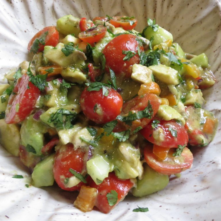 Avocado Salad in a gray textured bowl.