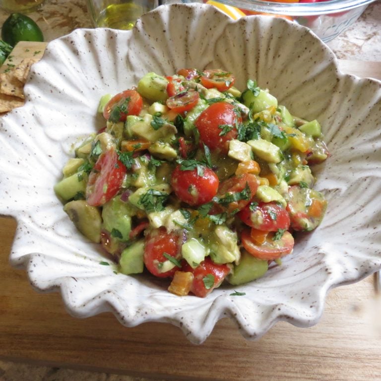 Avocado Salad in a gray textured bowl.