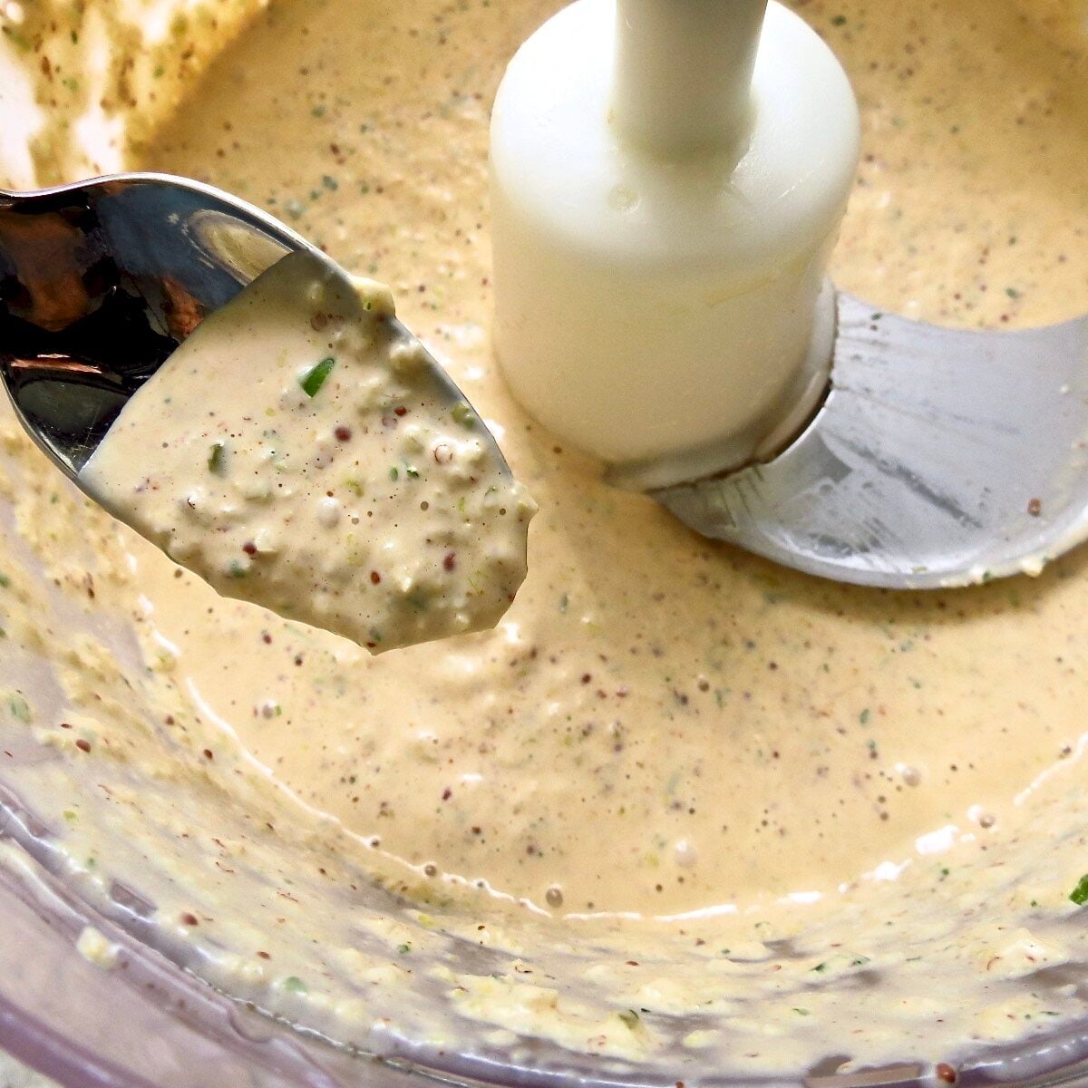 Creamy remoulade sauce in a food processor.