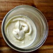 Overlooking Homemade Mayonnaise With A Creole Kick in a glass mason jar.