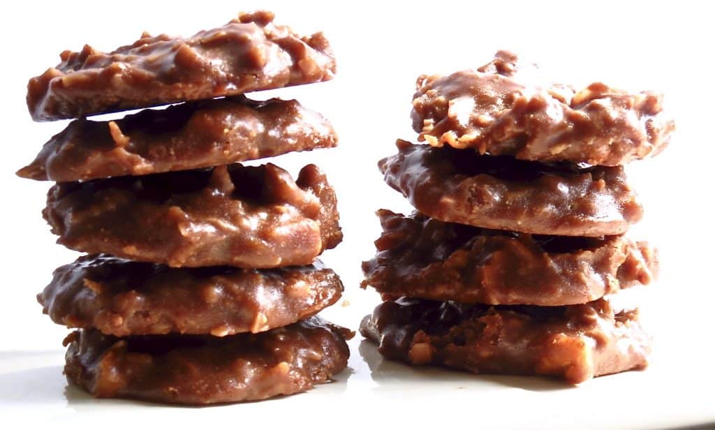 Stacks of German Chocolate No-Bakes on a white plate./