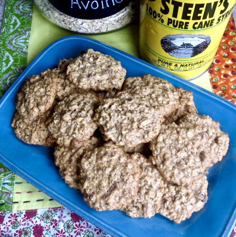 Oatmeal cookies on a blue plate.