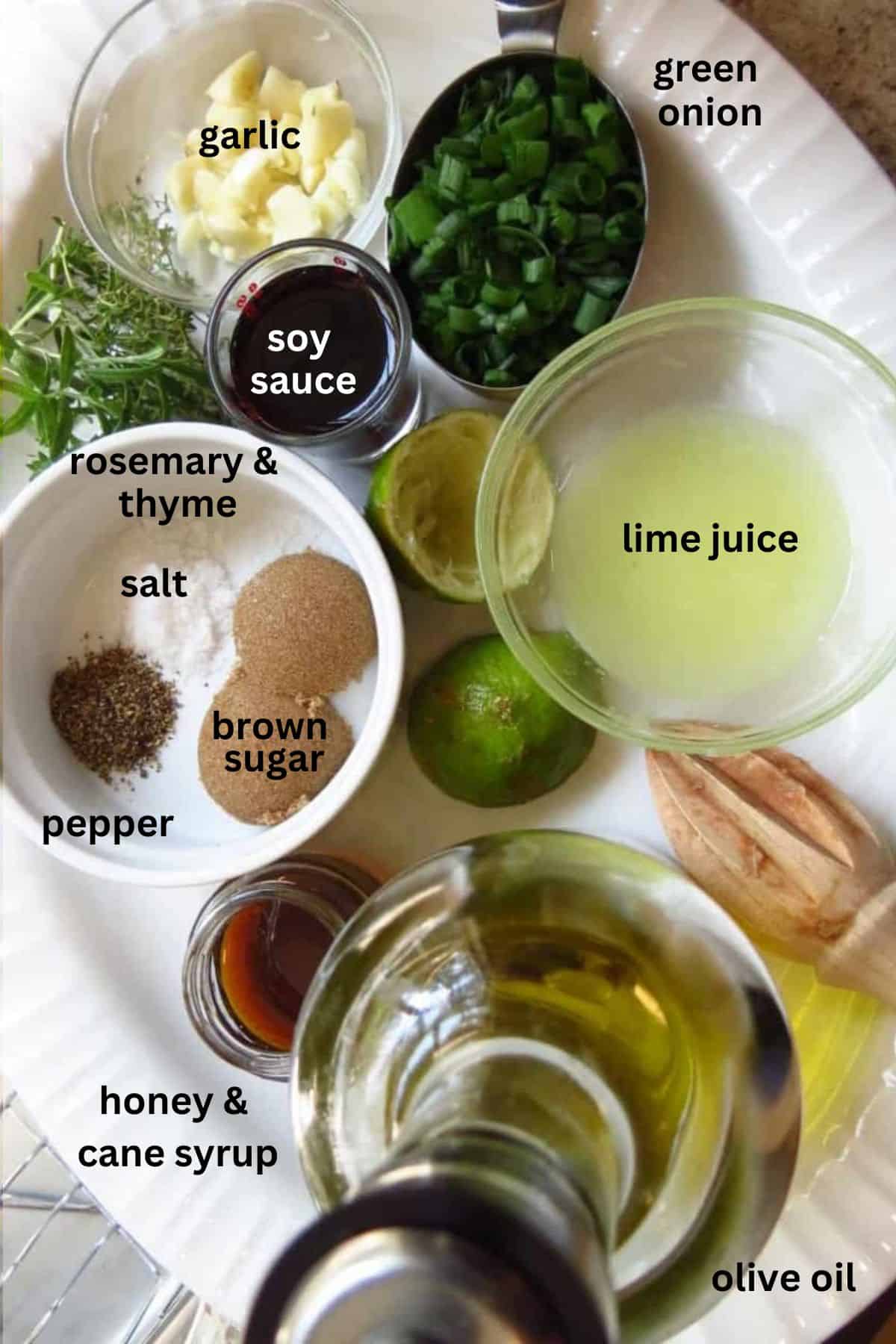 A white tray with ingredients for a marinade.