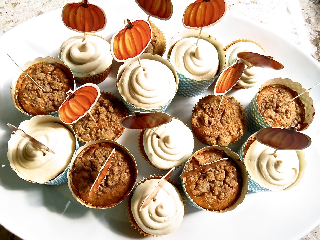 A white tray of different Pumpkin Muffins With Streusel.
