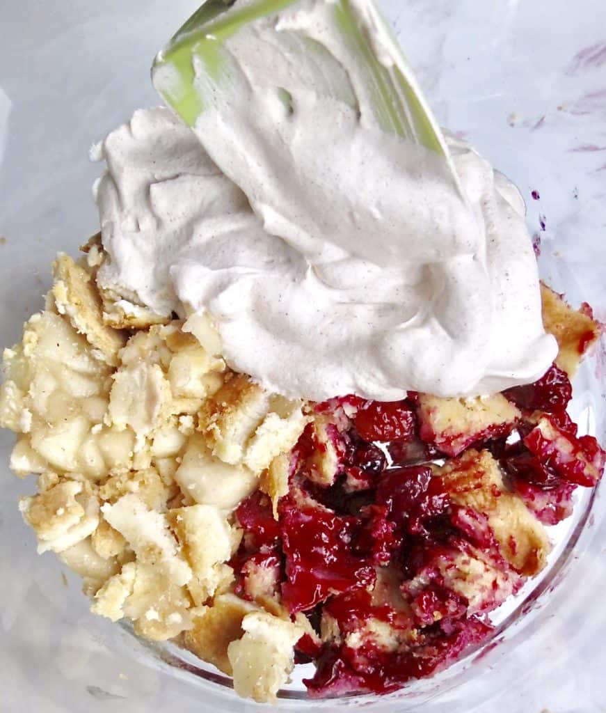 A layer of pie chunks with cream topping for Easy Pie Trifle Dessert.