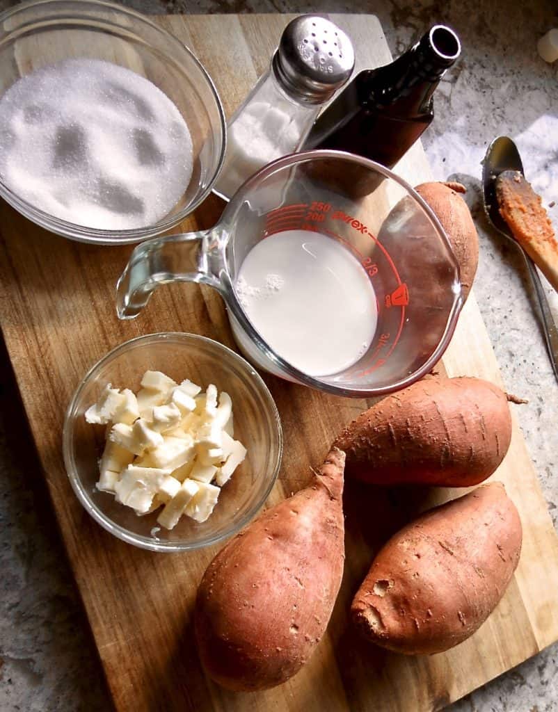 Ingredients of sweet potatoes, milk, butter, sugar, vanilla for Fresh Sweet Potato Casserole.