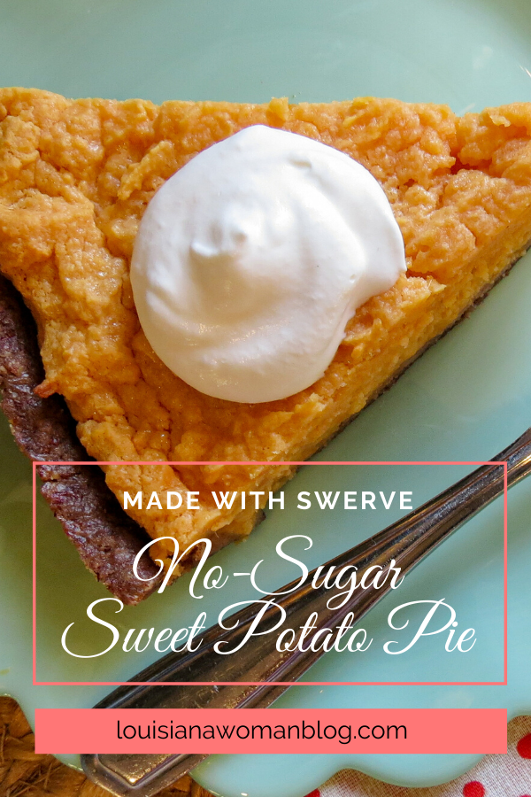 A piece of No Sugar Sweet Potato Pie with a dollop of whipped cream.