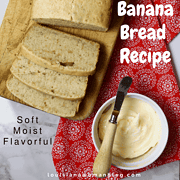 A loaf of banana bread partially sliced.