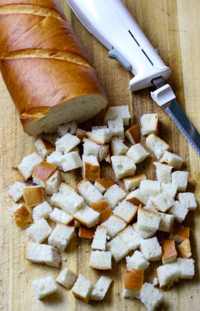 A loaf of bread sliced into cubes.