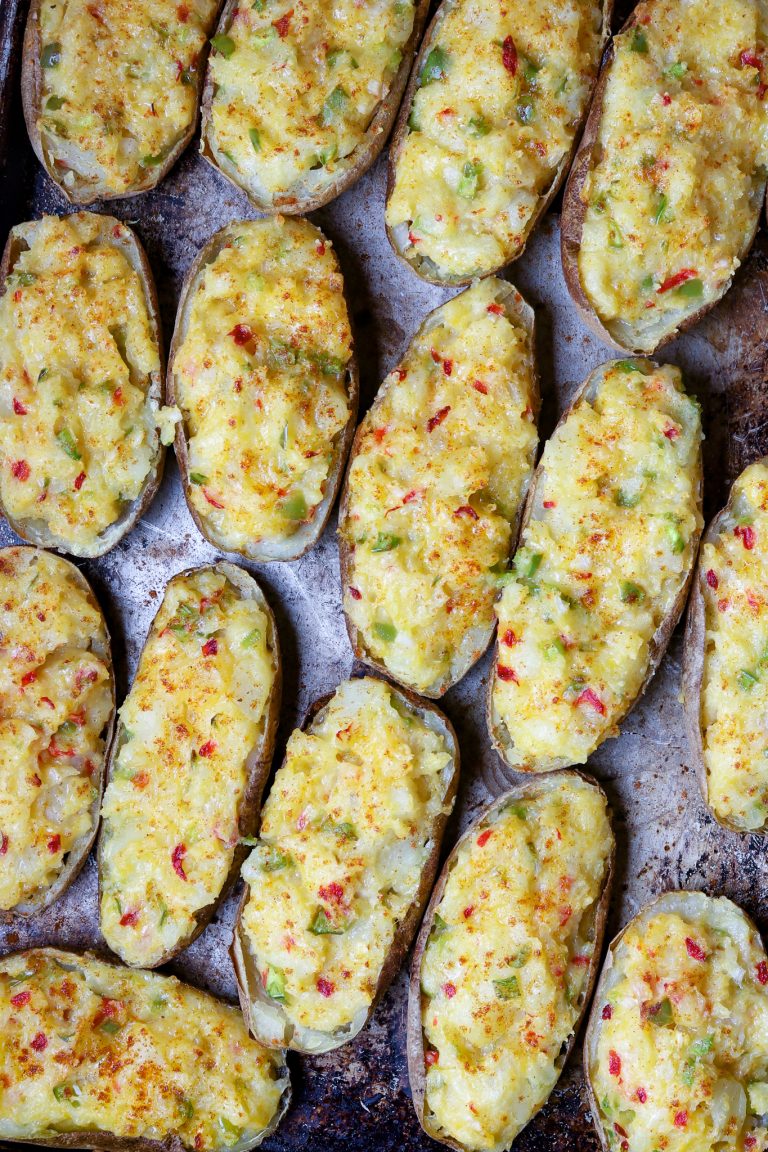A sheet pan full of twice-baked potatoes after they are baked.