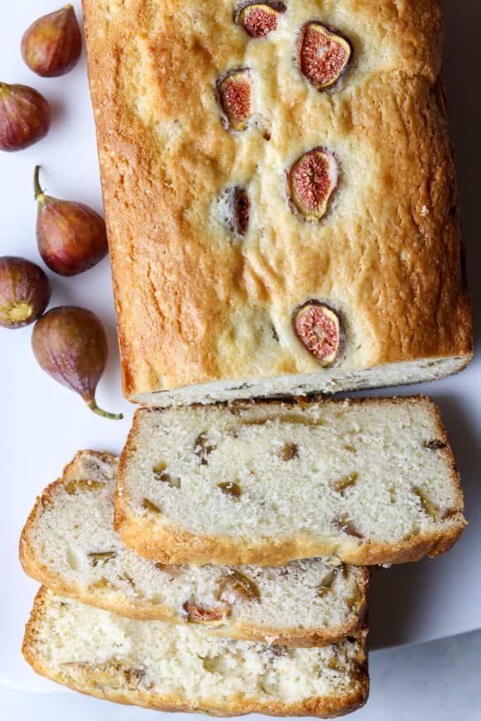 A loaf of Fresh Fig Bread and fresh figs.