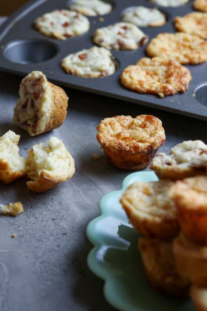 Mini-muffins, 3 way on a gray countertop.