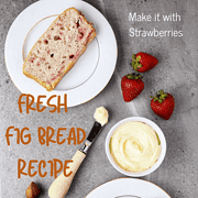Two plates of a slice of bread with strawberries and figs with a butter dish.