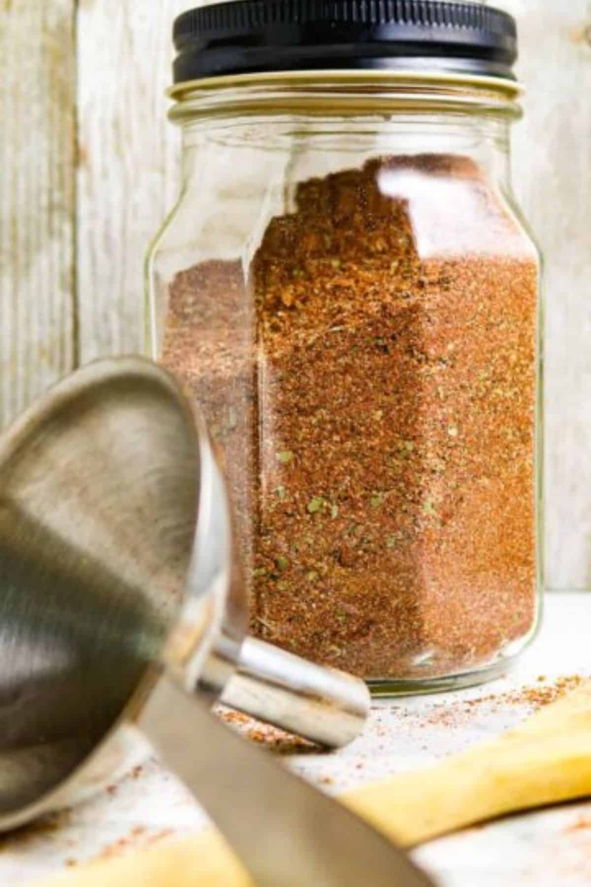 Glass jar of Best Homemade Taco Seasoning Recipe.