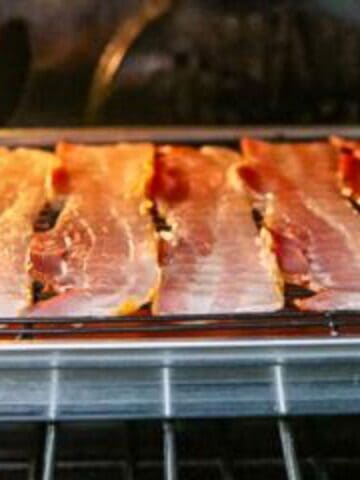 Bacon cooking in the oven.