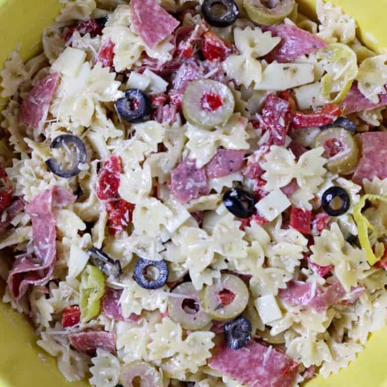 A large bowl of muffuletta pasta salad.