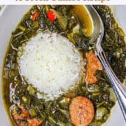 A bowl of gumbo zHerbes' with a scoop of white rice and a silver spoon in it.