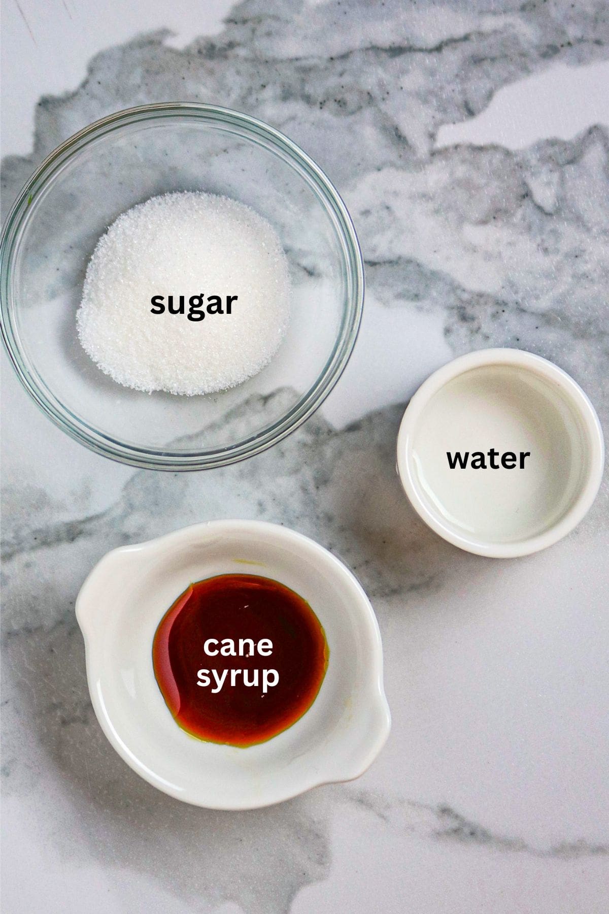 Ingredients of sugar, water, and cane syrup for a glaze.