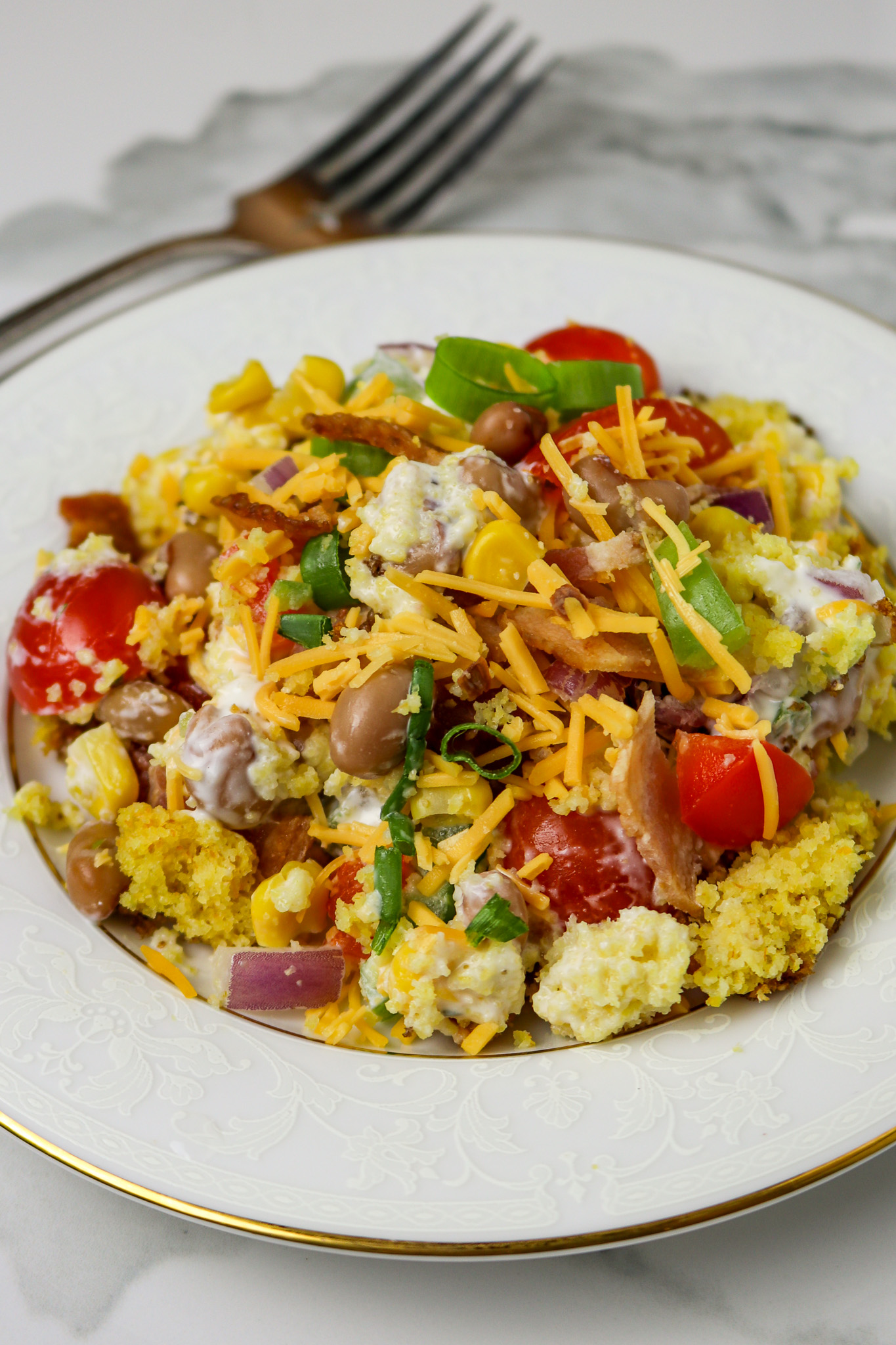 A white salad of cornbread salad.