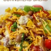 A white salad plate of cornbread salad.