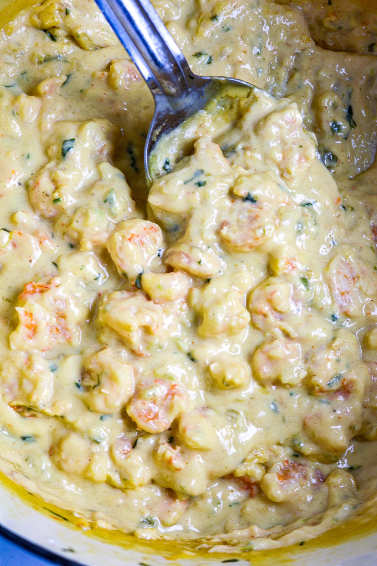 A pot of creamy shrimp sauce for shrimp pistolettes.