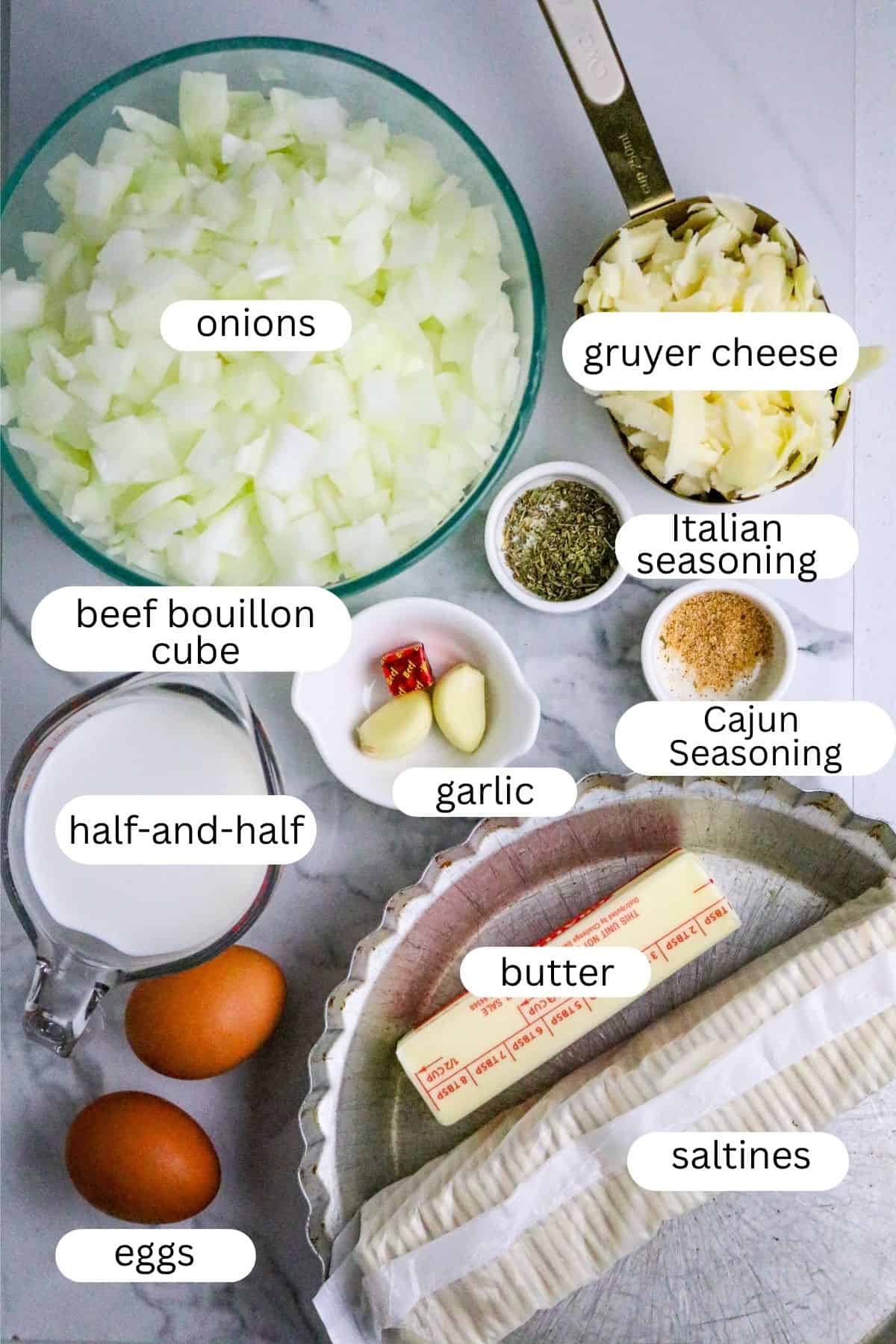 Ingredients of onion seasonings, butter, eggs, cream, and saltine crackers for an onion pie.