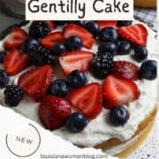 Pinterest of the Vanila Gentilly cake. a white cake covered with fresh berries.