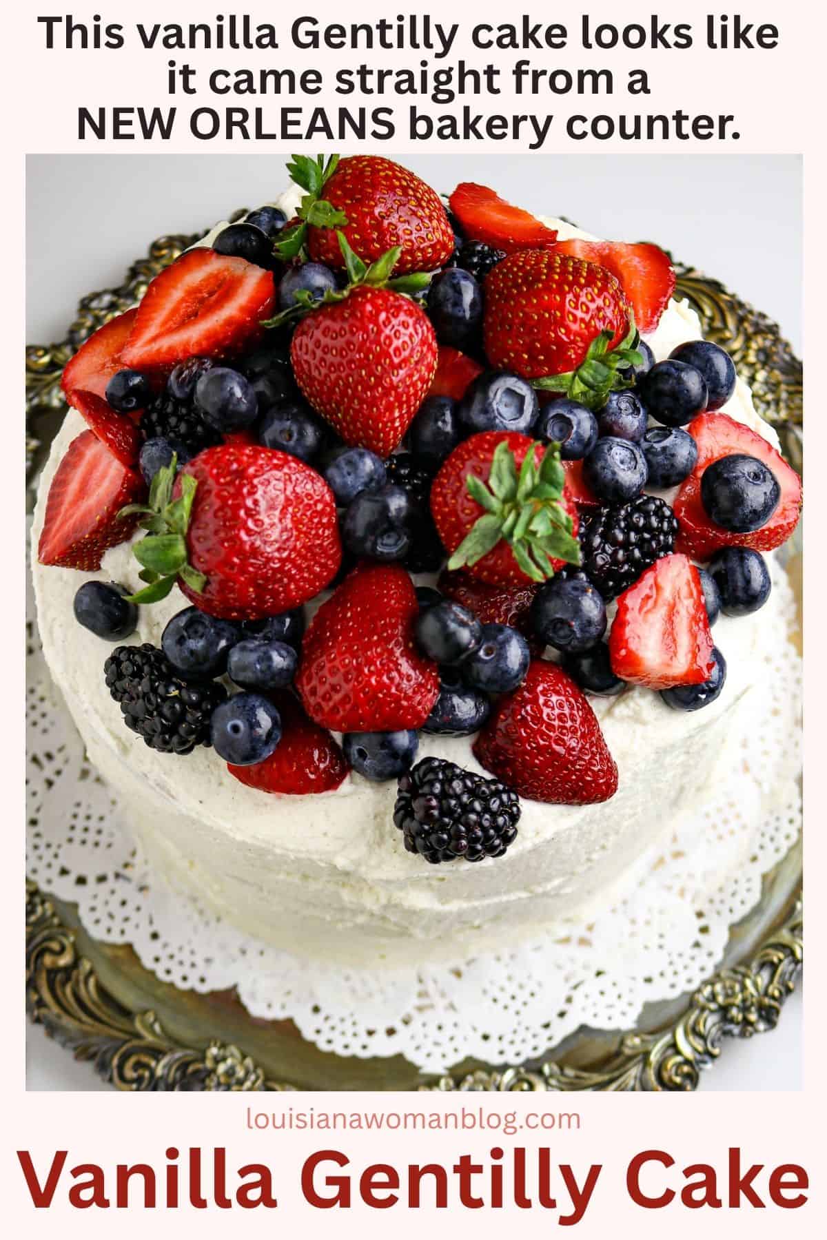 Pinterest of the Vanila Gentilly cake. a white cake covered with fresh berries.