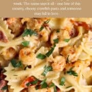 A Pinterest Pin with a closeup of crawfish cooked in a cream sauce over pasta.